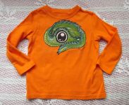 Zelený drak na oranžovém dětském tričku - velikost 98