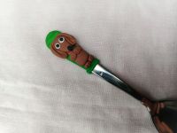 Hnědý jezevčík modelovaný na krátké mocca lžičce vhodný do nízkého šálku. Délka lžičky 11cm