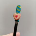 1. Čajová lžička dekorovaná lineckým cukrovím - vánoční téma - klasické slepované koláčky, srdíčka, kytičky