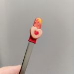 6. Čajová lžička dekorovaná lineckým cukrovím - vánoční téma - klasické slepované koláčky, srdíčka, kytičky