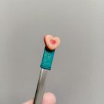 8. Čajová lžička dekorovaná lineckým cukrovím - vánoční téma - klasické slepované koláčky, srdíčka, kytičky